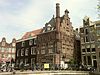Vredenburgh-Amsterdam7 -  Huize Vredenburgh, Vredenburgersteeg 1 Amsterdam. Panden deels uit de 15e en 16e eeuw, aanbouw uit 1890 van architect A.C. Bleijs 