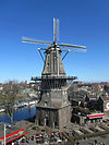 De gooyer amsterdam -  Looking east towards windmill De Gooyer at Funenkade in Amsterdam. De Gooyer is a so-called tower mill, a type of windmill built on top of a pedestal to raise it above the surrounding buildings. The beer brewery Brouwerij 't IJ is housed in the adjacent building, a former bathhouse. 