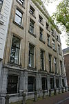 Pand gebouwd door middel van hergebruik bestaande woning en twee nieuwe traveeën