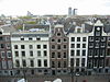 WLM - Minke Wagenaar - 10-04-21 The Bank voorheen ABN-AmRo 048 - De Herengracht, tussen de Utrechtsestraat en de Amstel. Rechts het woonhuis van Michiel Cohen. Aan de einder (rechts) de hoogbouw van de Nederlandse Bank op het Frederiksplein. Verbouwing van het voormalige ABN-Amro hoofdkantoor aan het Rembrandtplein te Amsterdam Rondleiding op woensdag 21 april 2010 voor de architecten van de BNA Kring Amsterdam-Kennemerland, door Frits van Dongen van de Architecten Cie. 