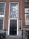 Pand met gevel onder gesneden lijst en puntgevel met oeils de boeuf aan de achterzijde