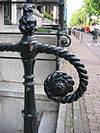 WLM - Minke Wagenaar - Keizersgracht 148 Amsterdam - Keizersgracht 148 Amsterdam Pand met gevel onder gesneden rechte lijst en balustrade (plm 1800), met rijk gesneden deurpartij (plm 1800). Rijksmonument 2505 