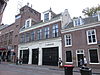Amsterdam, Reguliersdwarsstraat 106 -  voormalig koetshuis met bovenwoningen