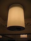 WLM - Minke Wagenaar - 2004 Barlaeus Opening 10 - Gerestaureerd plafond van de aula met nieuwe lampen met geÃ¯ntegreerde luchtbehandeling. Feestelijke opening van het gerestaureerde Barlaeus Gymnasium op 26 november 2004 door burgemeester Cohen. In 1884-1885 tot stand gekomen eerste stedelijk GYMNASIUM met de voorgevel aan de zijde van de Weteringschans en achtergevel aan de Zieseniskade. Vanaf 1927 'Barlaeusgymnasium' genoemd. Gebouwd naar een ontwerp van de architecten W. Springer en J.B. Springer in een gemengde stijl van neo- classicisme e…