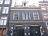 Amsterdam, Reguliersdwarsstraat 78 -  voormalig koetshuis met gevel onder rechte lijst waarboven een dwars dag