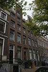 Pand met halsgevel van het type met het 'doorboorde-bloem-motief'