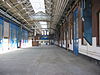 WLM - Minke Wagenaar - 10-06-27 De Hallen Amsterdam 010 - Voormalige tramremise aan het Bellamyplein in Amsterdam Oud-West. Rijksmonument o.a. vanwege de 'Polonceau' spanten. Zeldzaam voorbeeld ervan in Nederland. Antoine-RÃ©my Polonceau (Reims, 1778 - Roche-lez-BeauprÃ©, 1847) was een Franse ingenieur. Hij bouwde de Simplontunnel. Hij is Ã©Ã©n van de 72 Fransen wier namen op de Eiffeltoren gegrift staan. En hij is de uitvinder van dit type spant . . . 