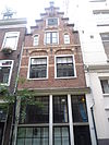 Pand met gepleisterde trapgevel