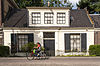 Artis Weltevreden1 -  Artis, Amsterdam. Voormalig Buitenhuis Weltevreden. Houten dwarshuis. Deur en snijraam in omlijsting. Brede dakkapel. 