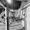 Interieur hijsrad noordelijke vleugel naar het zuiden. - Amsterdam - 20011459 - RCE -  West Indisch Pakhuis: interieur hijsrad noordelijke vleugel naar het zuiden. 