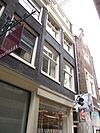 Pand met 18e-eeuwse gevel onder latere rechte lijst en dakkapel