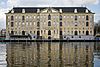 Nederlands Scheepvaart Museum - The Nederlands Scheepvaartmuseum (Netherlands Maritime Museum) is a museum in Amsterdam, The Netherlands. The museum is housed in a former naval storehouse, 's Lands Zeemagazijn or Admiraliteits Magazijn, constructed in 1656. The museum moved to this building in 1973. The museum is dedicated to maritime history and contains many artifacts associated with shipping and sailing. The collection contains, among other things, paintings, scale models, weapons and world maps. The paintings depict Dutch…