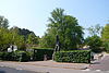 Kraantje Lek -  Restaurant Kraantje Lek in Overveen, Bloemendaal, the Netherlands. The black sculpture is the tarred over remains of a monumental tree known locally as the 