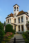 Erfscheiding Bella Vista -  Erfscheiding van dubbele villa Bella Vista op Parklaan 20 / Willemslaan 7 in het Spieghel op een mooie zonnige dag. 