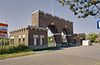 Overzicht toegangspoort met werkplaats, voormalig Duits logement - Huisduinen - 20343273 - RCE -  Logement Duitse Officiren/Atlantikw: Overzicht toegangspoort met werkplaats, voormalig Duits logement (opmerking: Gefotografeerd voor het Monumenten boek, Karel Loeff, bladzijde 20) 