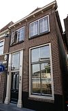 Eenvoudige laat 19e-eeuwse gevel, voor ouder pand
