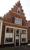 Pand met gave bakstenen trapgevel