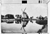 Watermolen te Dirkshorn aan het water schuin van voren gefotografeerd; reproduktie - Dirkshorn - 20057631 - RCE -  Ondermolen Schagerwaard of Witsmeer: Watermolen te Dirkshorn aan het water schuin van voren gefotografeerd; reproduktie 