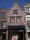 Grote Noord 40 te Hoorn -  Rijksmonument: 22339. Adres: Grote Noord 40 te Hoorn, Noord-Holland, Nederland. Gevel heeft twee friezen, 3 gevelstenen, waarvan een met het Gulden Vlies.  Rijksmonument: 22339. Adress: Grote Noord 40 in Hoorn, North Holland, the Netherlands. Facade has two friezes, 3 gable stones of one with the Golden Fleece.