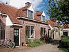 't Rooie Dorp: woningblok van vier arbeiderswoningen