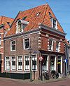 Pand met gevel met fragmenten
