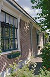 Rechter zijgevel met schuifvensters - Twisk - 20350849 - RCE -  Boerderijen/ Stolpboerderij: Rechter zijgevel met schuifvensters 