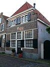 WLM - M.arjon - Muiden Weesperstraat 52 (1) - Pand met afgeknotte gevel met oude onderpui, 1644. 
