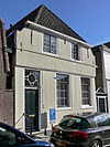 WLM - M.arjon - Muiden Weesperstraat 9 - Pand met afgeknotte gepleisterde gevel, 17e eeuw. 