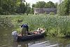 Visser op de 's-Gravelandse Vaart, bij het torenfort Uitermeer, onderdeel van de Nieuwe Hollandse Waterlinie - Weesp - 20429691 - RCE -  's-Gravelandse Vaart: Visser op de 's-Gravelandse Vaart, bij het torenfort Uitermeer, onderdeel van de Nieuwe Hollandse Waterlinie (opmerking: Gefotografeerd voor publicatie over Cultuurlandschap)