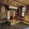 Interieur, overzicht van de schouw in het interieur van het houten huis binnen het stenen huis - Zaandam - 20341840 - RCE -  Czaar Peterhuisje - Museum: Interieur, overzicht van de schouw in het interieur van het houten huis binnen het stenen huis 