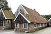 Boerderij met uitbouw in vakwerk ter weerszijden van de niendeu,r rechteraanzicht; Koppelsbrink 32, Borne