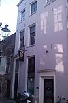 Huis met gepleisterde lijstgevel