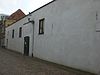 Pand, waarin wellicht een deel van de laat-middeleeuwse stadsmuur is bewaard gebleven