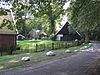 Erf van Boerderij van landgoed Het Stroot met schuur - RM 510587 en RM 510588.JPG -  Boerderij van het hallehuistype met tweekapsschuur onder met rode hollandse pannen gedekt zadeldak. Bouwjaar 1917. Onderdeel van Landgoed 