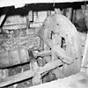 Interieur van watergedreven molen met onderslagrad, waterwiel - Haaksbergen - 20283559 - RCE -  Oostendorperwatermolen: Interieur van watergedreven molen met onderslagrad, waterwiel 