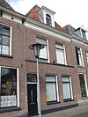 Pand met lijstgevel en dakkapel