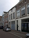 Pand met gepleisterde gevel