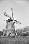 Korenmolen van opzij gefotografeerd - Staphorst - 20139421 - RCE -  De Leijen: Korenmolen van opzij gefotografeerd 