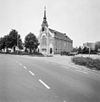 Overzicht zuidwestgevel met geveltoren - Zwartsluis - 20350316 - RCE -  Gereformeerde Cingelse kerk: Overzicht zuidwestgevel met geveltoren (opmerking: Gefotografeerd voor Monumenten In Nederland Overijssel, bladzijde 281) 