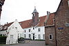 Amersfoort.Muurhuizen.199.JPG -  Muurhuizen 199: Huis met forse 16e eeuwse gevel, gewit zadeldak, uitgebouwd aan de Muurhuizen 