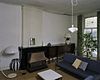 Interieur, voorzijde eerste verdieping, overzicht kamer links met schouw - Baarn - 20338477 - RCE -  Villa Pera: Interieur, voorzijde eerste verdieping, overzicht kamer links met schouw 