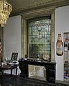 Interieur begane grond, rechter achterkamer met Utrechtse schouw en venster met glas in loodraam - Baarn - 20338515 - RCE -  Villa Pera: Interieur begane grond, rechter achterkamer met Utrechtse schouw en venster met glas in loodraam 