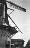Achtkante stellingmolen tijdens het strijken van de gebroken roede - Achttienhoven - 20004584 - RCE -  De Kraai: Achtkante stellingmolen tijdens het strijken van de gebroken roede 
