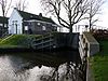 CanalLock.Eemnes -  Canal lock in Eemnesser vaart, Eemnes. Built 19th century. Its national-monument number is 516169. To the left is a pumping station.