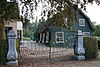 Liefhoven-1 -  De schuur, het hek en het woonhuis van boerderij Liefhoven in Linschoten 