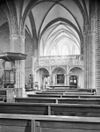 Inwendig naar het oosten en oksaal - Rhenen - 20186285 - RCE -  Cunerakerk En Toren: inwendig naar het oosten en oksaal 