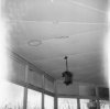 Plafond met waterschade en lamp in voormalige korenmolen, thans cafÃ©-restaurant