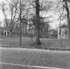 Het huis en de oranjerie annex koetshuis