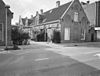 Overzicht Gansstraat 87, voor- en zijgevel met neogotische nissen - Utrecht - 20330027 - RCE -  Martinushofje: Overzicht Gansstraat 87, voor- en zijgevel met neogotische nissen 
