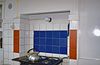 Interieur, keuken fornuis met blauwe en rode wandtegels - Utrecht - 20001526 - RCE -  Interieur, keuken fornuis met blauwe en rode wandtegels 